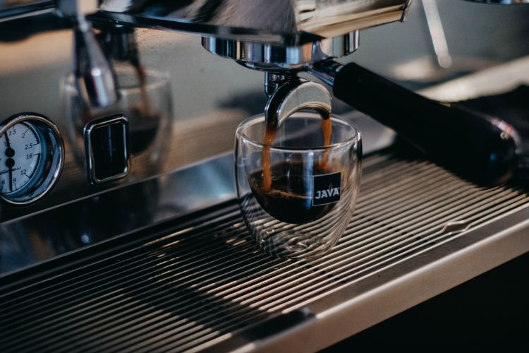 Coffee machine brewing hot espresso