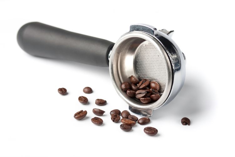 Double walled portafilter on white background