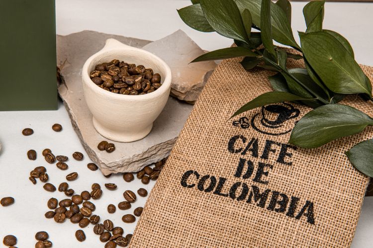 Cup with Coffee Beans and a Burlap Bag