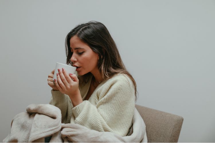 A Woman Drinking Mushroom Coffee