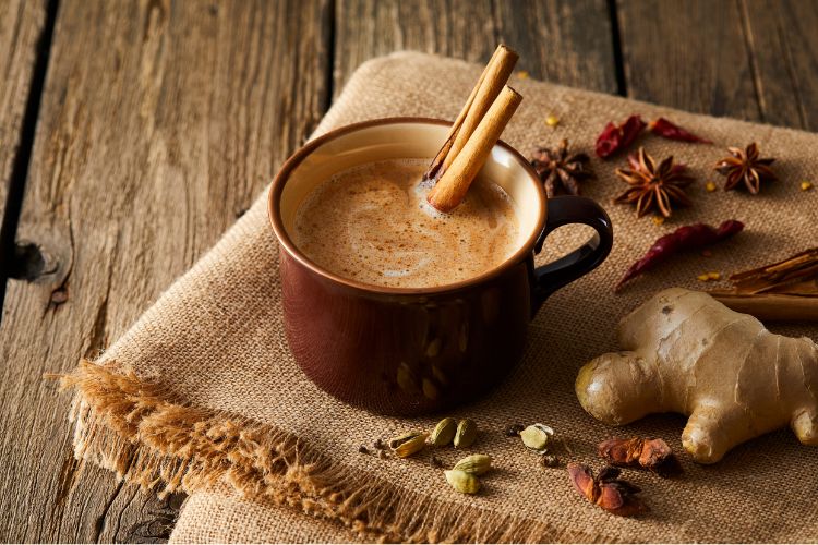 Cinnamon Added to Ryza Coffee in Rustic Setting