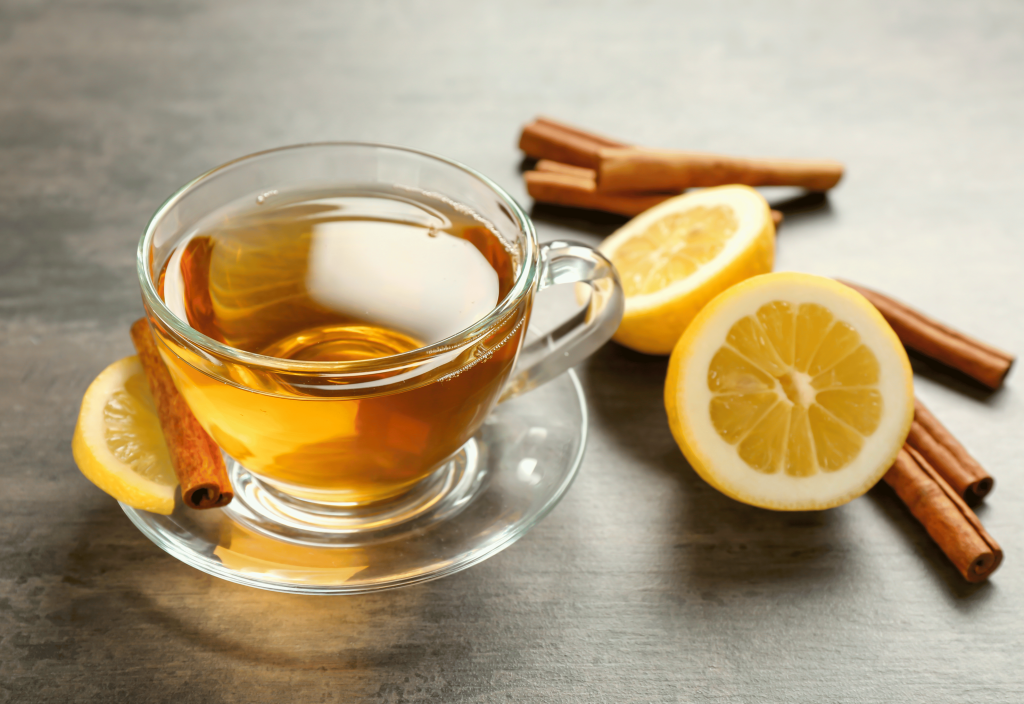 A cup of russian tea with ingredients around it